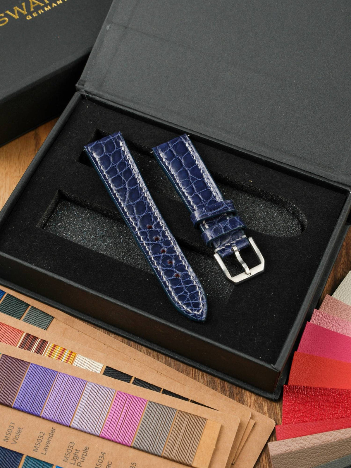 Finished navy alligator strap in its box, ready to ship – Atelier Taha