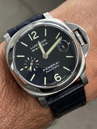 Panerai Luminor Marina on the wrist with a navy alligator strap – handmade by Atelier Taha